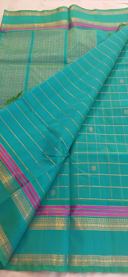 double pettu ahimsa silk cotton saree with checks 